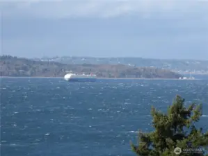 You can see Pt. Robinson at the tip of Vashon/Maury Island... and on a clear day, a few of the buildings in downtown Seattle and Mt Baker come into view!