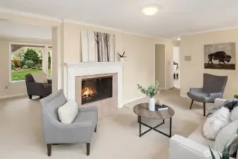 Double-Sided Fireplace Enjoyed from Family Room and Rec Room