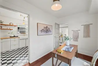 Main floor den/bonus room, open to kitchen and dining room