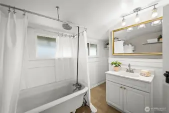 Upstairs full bath with original clawfoot teb