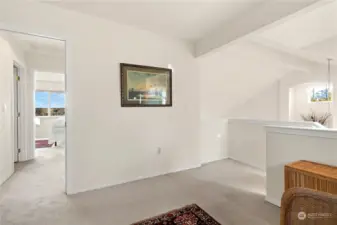 Open area leading into the large bedroom.