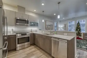 Modern kitchen with high end Bosch appliances and granite counters.