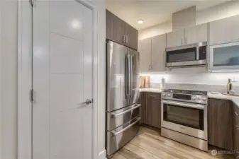 Additional pantry space in addition to plenty of cabinet space.