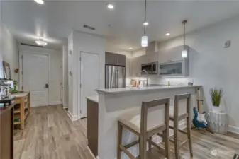 Kitchen is open to the living space with conevient counter seating.