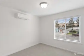 Second bedroom with individually-controlled mini split for heat and air conditioning