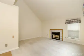 sunny family room with slider to back yard