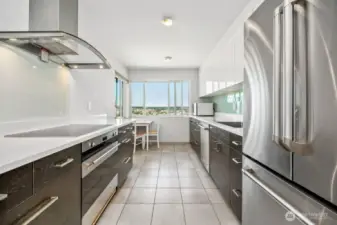 Galley Style Kitchen with Corner Windows