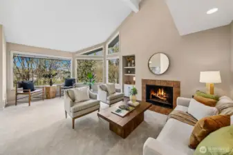 Cozy fireplace anchors the living and feels like a lodge or chalet.  *Photo is from when the condo was staged.