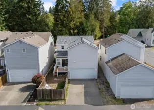 Additional parking in driveway in the alley.