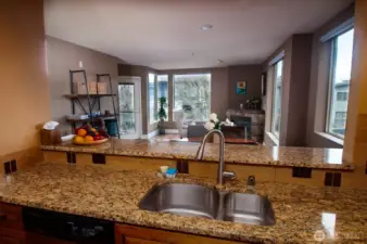 Kitchen is open to spacious Great Room and enjoys views and sunshine from the many windows.