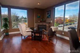 Corner gas fireplace provides cozy, welcome warmth on chilly days and evenings.