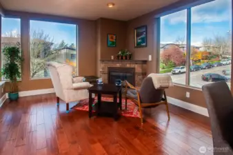 Corner gas fireplace provides cozy, welcome warmth on chilly days and evenings.