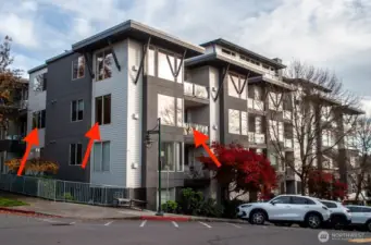 Red arrows show location of #306 on the northwest corner of the building.