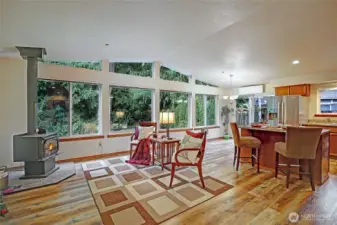 Vaulted open concept Great room. Faces your private forest view.