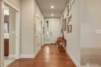 Looking back to the front door- shared bath to the left- front bedroom on the left- Den/Office to the right.