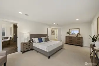 Tons of room for a king-sized bed here, as well as multiple dressers!