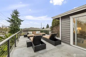 The private deck off the primary makes the most of the views, offering a space to relax with coffee, wine or a good book while taking in gorgeous views and sunsets.