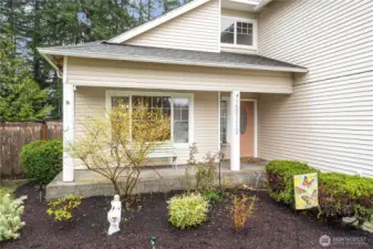 Freshly landscaped with the cutest covered front porch.