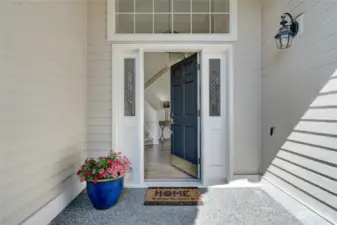 Attractive entry with freshly painted front door.