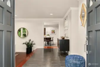 The Double front door and warm tile entryway welcomes you. Dark cherry hardwoods throughout the main level.