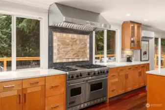 This 6-burner Viking gas stove, with double ovens and custom tile backsplash is a chef's dream.