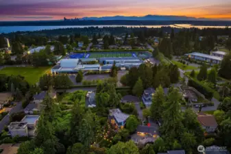 This aerial shows the proximity to great schools, Puget Sound, Seattle city skyline, and the Olympic Mountains.