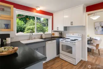 Totally cool kitchen with view of the backyard