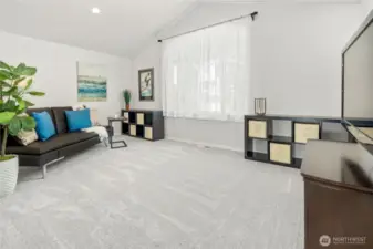 Family Room Featuring Vaulted Ceilings