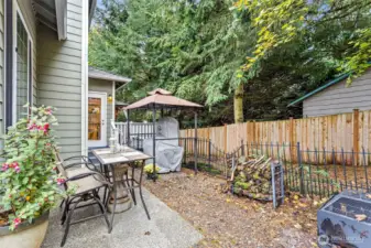 Low Maintenance and pet friendly back yard with large dog pen and fully fenced back yard