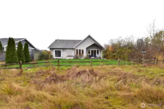 Adjacent to a green belt for added privacy.