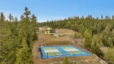 Pickleball and basketball ready now for your exercise and enjoyment.  All those windows on the clubhouse will make for some fantastic views.