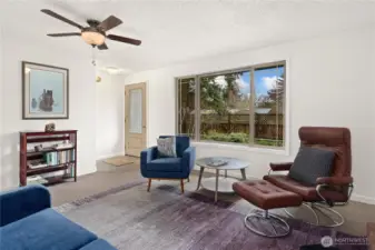 Enter through the front door into the living room space. Freshly painted.