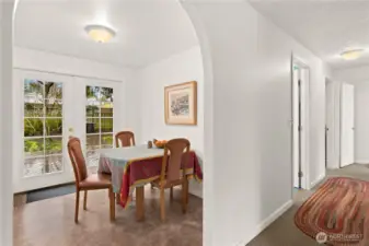 Hall way and dining area. Double French door to the back deck.