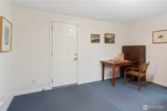 Family room and door to the garage.