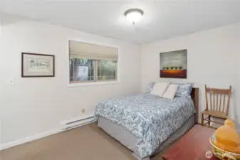 Primary bedroom is larger than other two rooms. Plus their is an adjacent half bath.