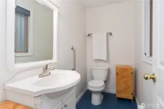 Primary half bath, freshly painted.