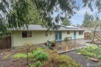 View of the back of the house with the solar panels installed in 2024. Roof installed in 2024 too.