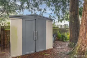 Garden shed in back corner of the property.