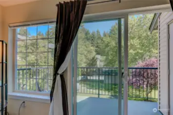 Patio overlooks lush landscaping