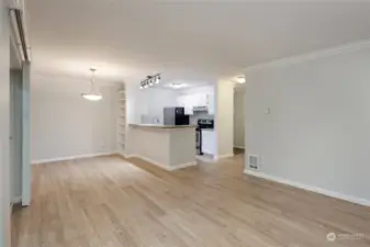 Living room looking to the dining room and kitchen.