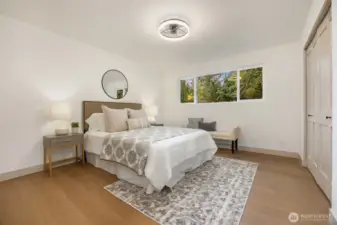 Additional upstairs bedroom equipped with stunning hardwoods and great closet space.