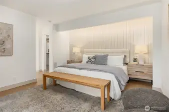The main level now includes a newly created primary suite, boasting a designer accent wall.