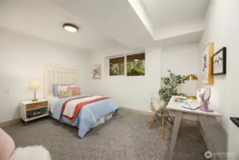 One of the two downstairs bedrooms. Darling.
