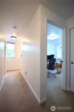Stairway and hallway to all the up stairs rooms.