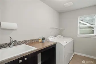 Utility room with sink