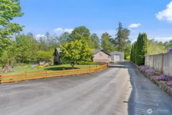 Long driveway to your home and HUGE shop!