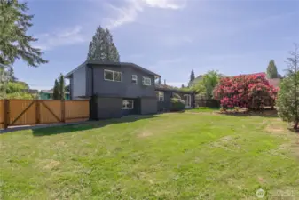 This home was wisely built toward the front of a large lot (nearly 1/4 acre), meaning the fully fenced backyard is substantial!