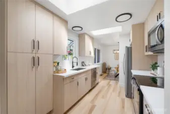 Incredible natural light from 2 skylights AND the grower's window box in the efficient, fully renovated kitchen!