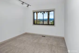 A 2nd bedroom on the main or a main floor office with peaceful views!