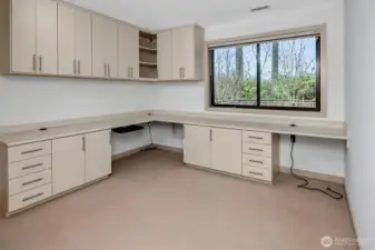 For those who work from home or need a designated study space, a custom-designed office by California Closets provides an exceptional workspace. Built-in cabinets and shelving ensure organization.